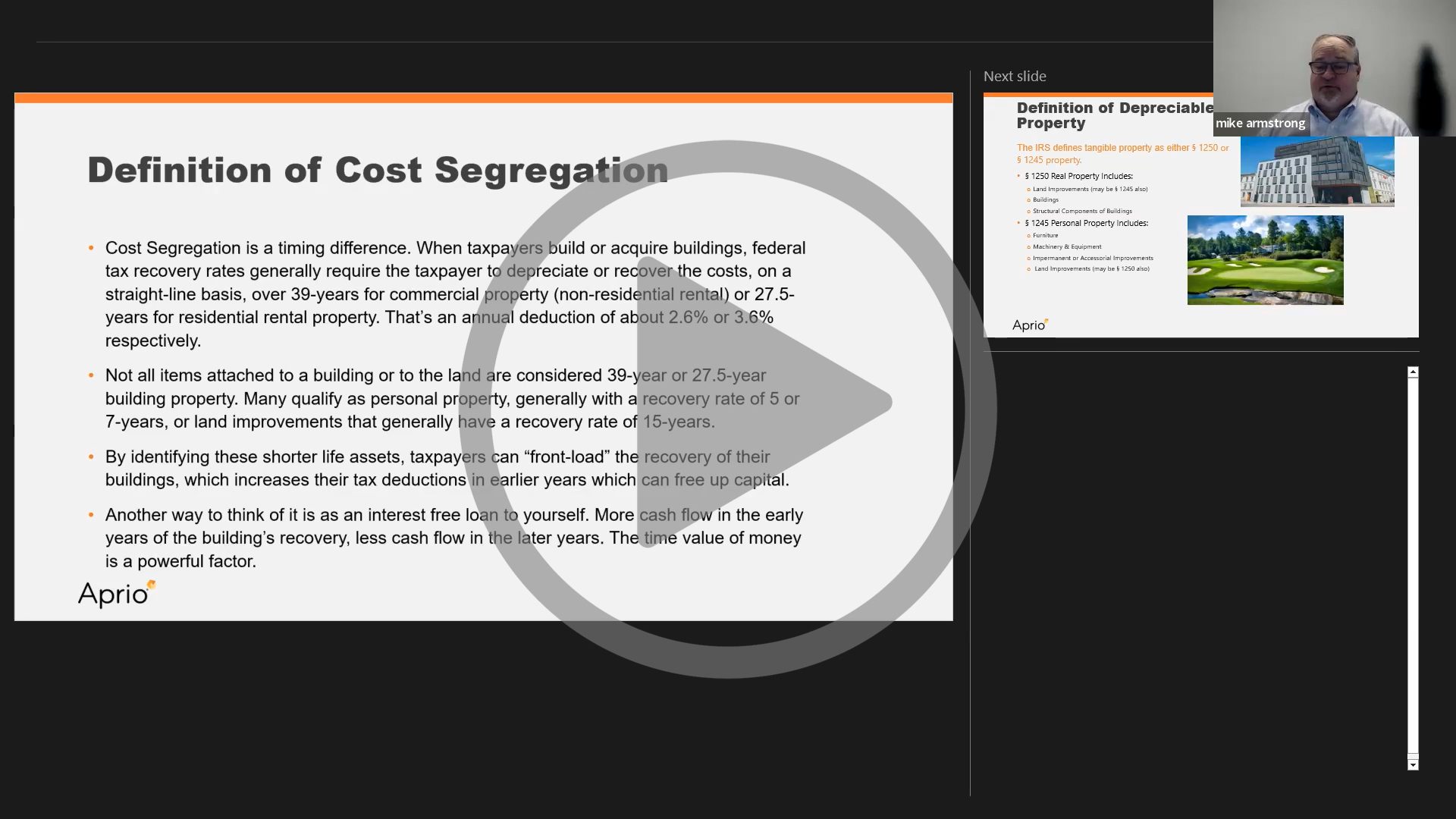 A presentation slide titled Definition of Cost Segregation with text explaining cost segregation and a small preview of the next slide on the right. A play button overlay is centered on the screen.