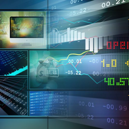 A digital collage of stock market charts, graphs, and numerical data displayed on monitors, representing financial trading and market analysis.