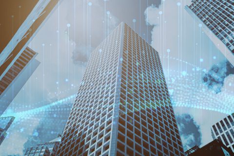 A tall office building viewed from below, surrounded by other skyscrapers, with digital lines and dots overlaying the sky.