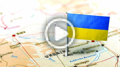 Map of Ukraine with a small Ukrainian flag marking the location and a play button icon overlayed in the center.