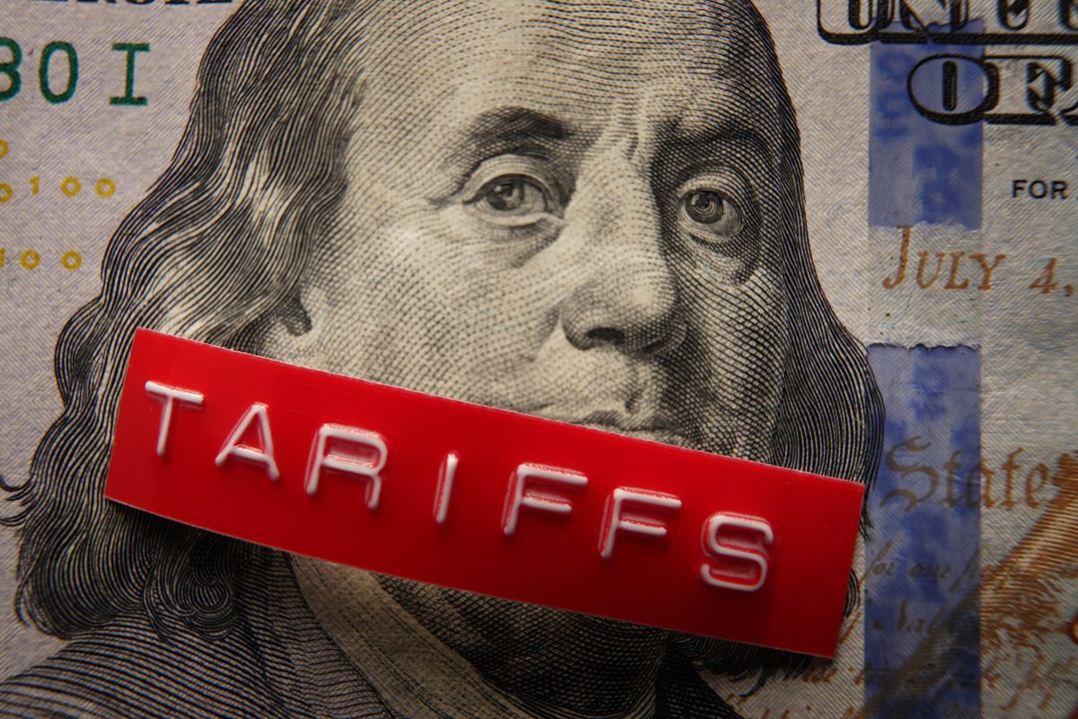 Red Tariffs label on a hundred dollar bill