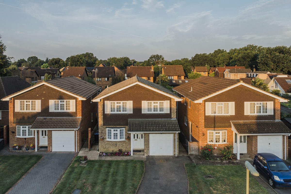 Houses in Surrey UK at sunrise, elevated view, morning light