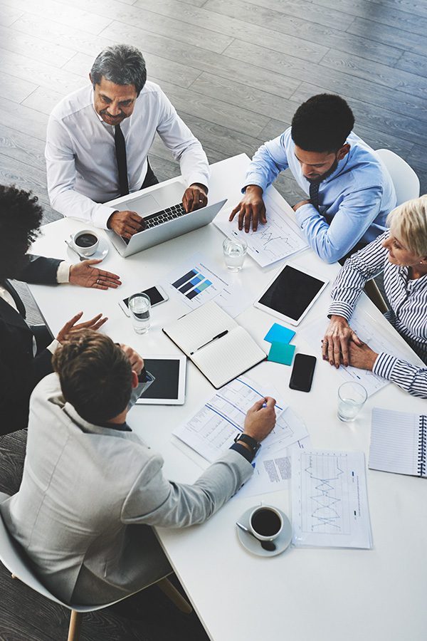 Group of business people in a meeting, overhead shot