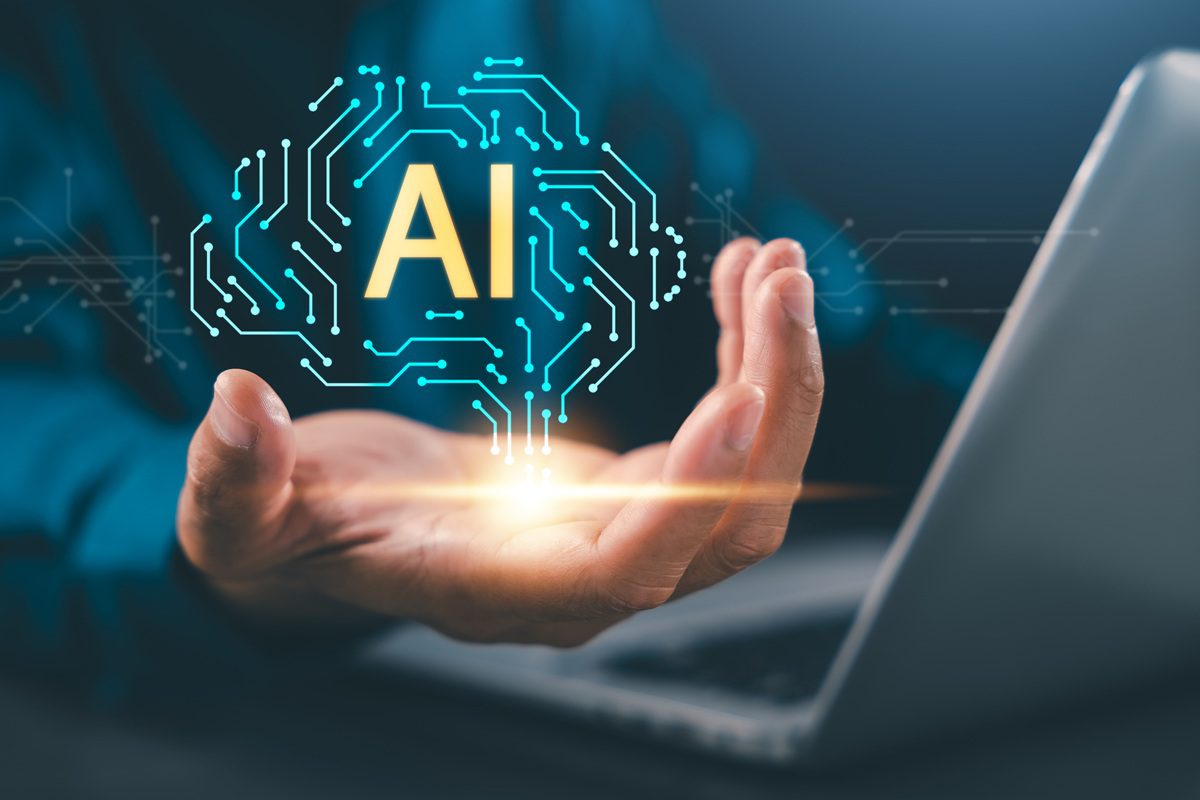 Human hand holds ai technology artificial intelligence robot smart circuit brain over laptop computer, digital innovation empowers future business growth and neural network analyzes data.