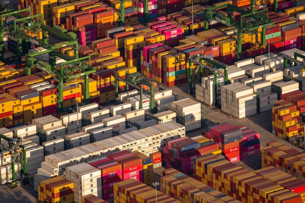 Aerial view of shipping containers stacked at the busy Port of Rodman in Panama. This strategic terminal on the Pacific entrance to the Panama Canal serves as a critical logistics and trade hub, facilitating global maritime commerce and international shipping operations.