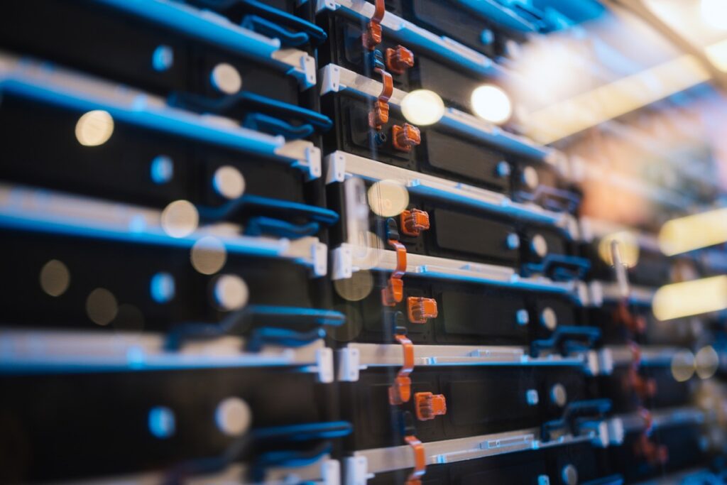 Close-up of advanced data center equipment with energy storage and cooling technology. Represents cloud computing, AI infrastructure, power efficiency, and digital transformation.