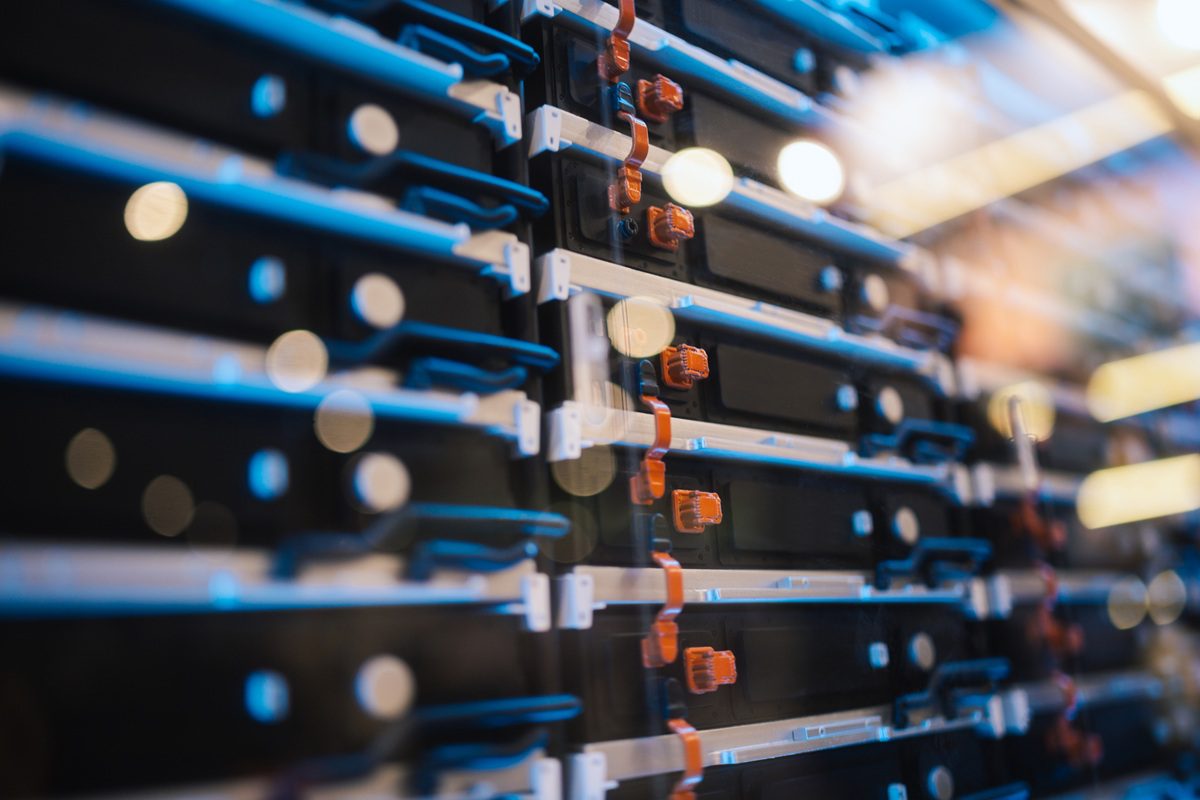Close-up of advanced data center equipment with energy storage and cooling technology. Represents cloud computing, AI infrastructure, power efficiency, and digital transformation.