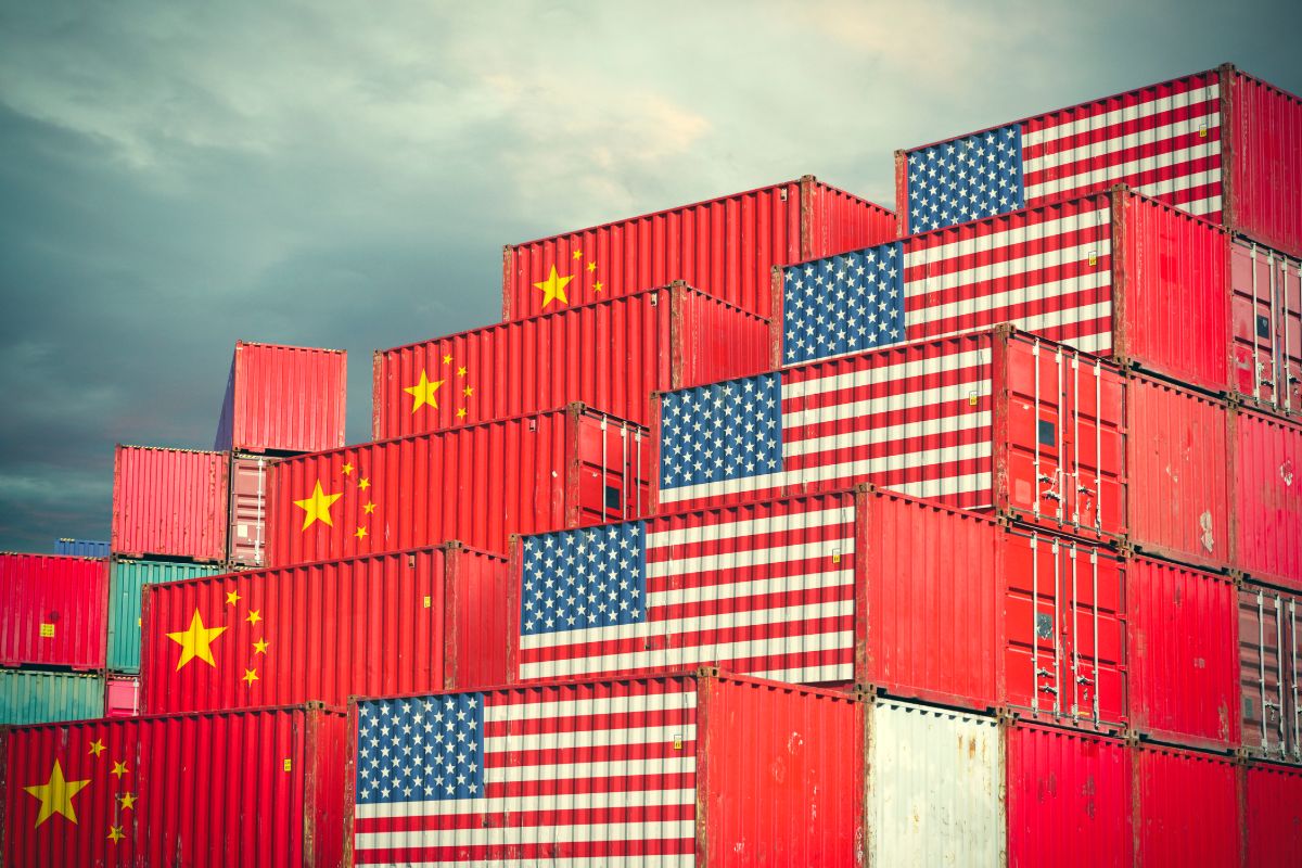 Chinese and United Stases cargo containers reflecting trade war and restrictions in export and import
