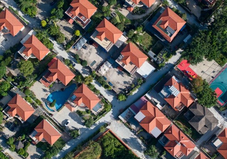 Aerial photography of rows of villa roofs
