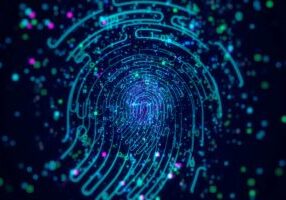 Digital generated image of data forming fingerprint icons on black background.