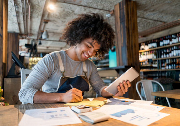 Business manager doing the books at a restaurant