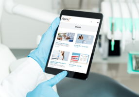 tablet screen in dentist's hands