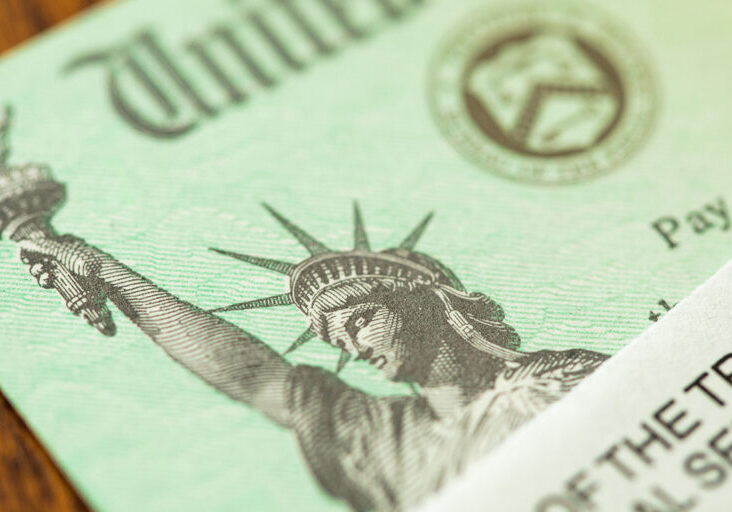 United States Internal Revenue Service, IRS, Check and Corner of Envelope.