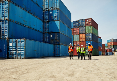 Logistics-Team-Walking-Together-in-Inland-Port-stock-photo