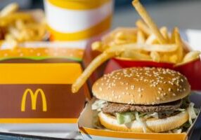 tray full of fast food in McDonalds Restaurant, Big Mac Menu with McDonalds logo box, Cheeseburger, French fries, Cola, 23.03.20 Kemer Turkey.