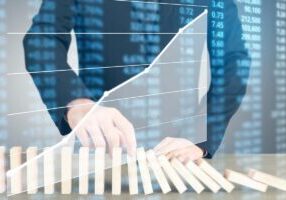 Stopping domino concept - stock photo