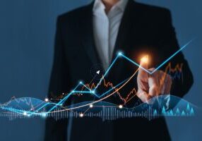 Businessman hand draws growth business graph progress and financial analyzing. Business development to success, profit and growing plan.