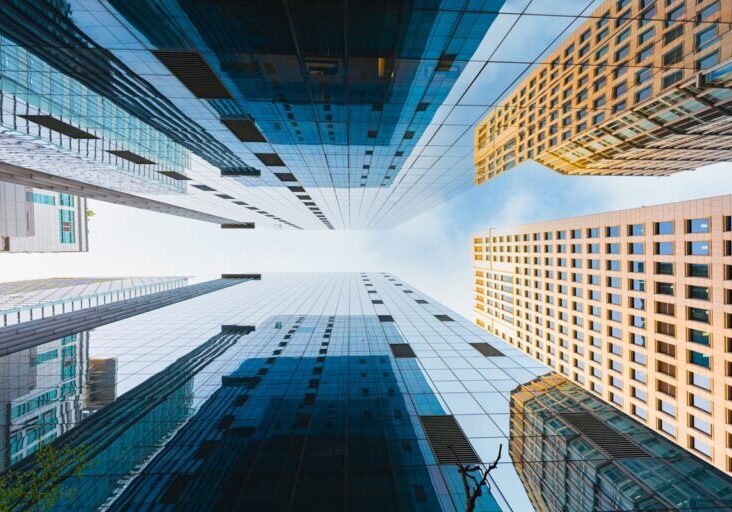 Glass modern building against sky