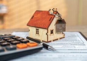 money, pile coin with saving book and paper home, concept